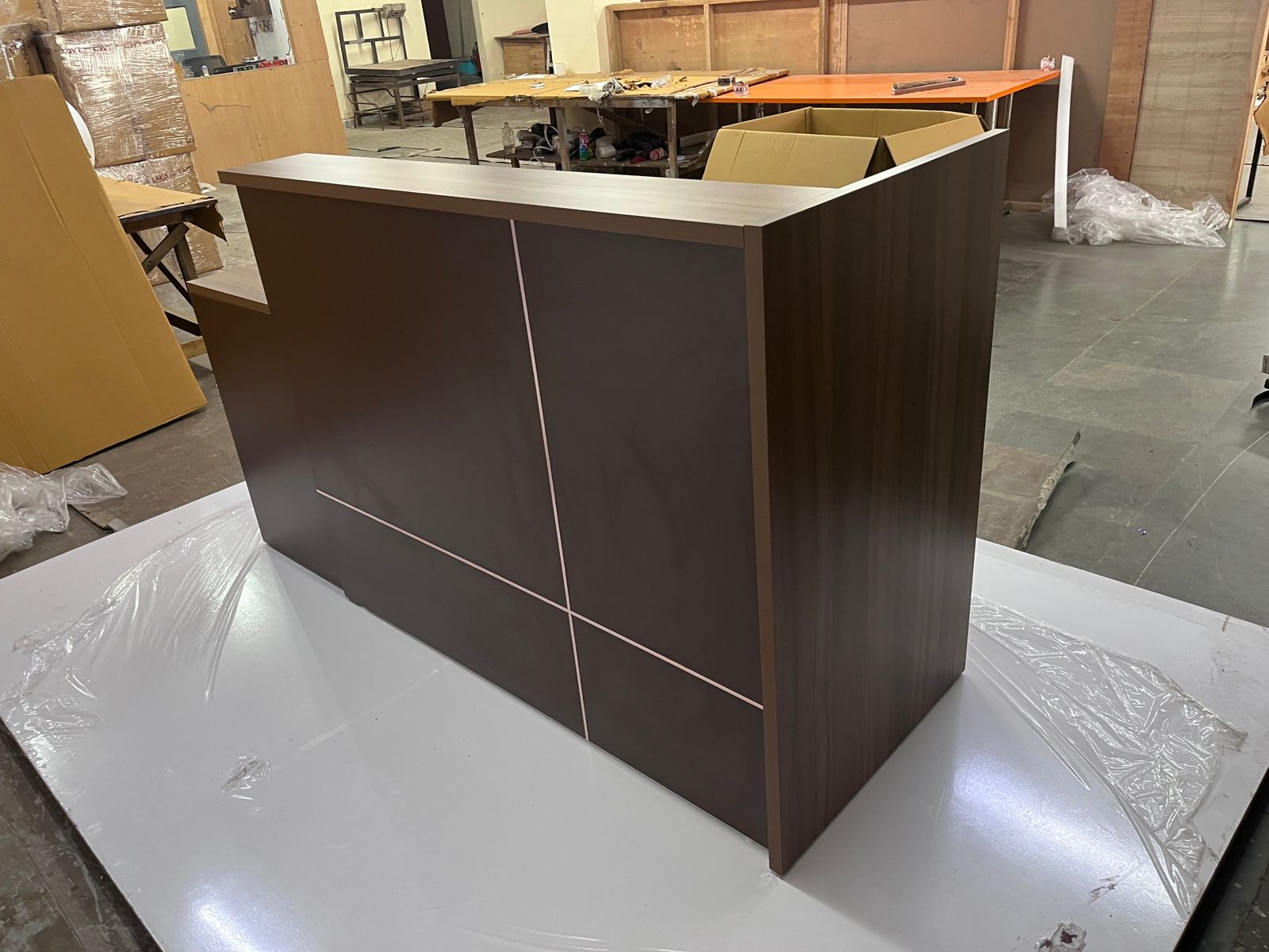Reception Table Made In Engineered Wood with Matte Grey & King Walnut Laminate and Inlaid Brass Strip Detailing, Built In Storage