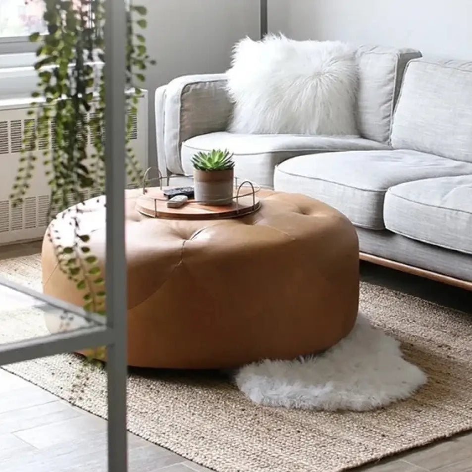 Ottoman Round Leather Coffee Table – Upholstered with High-Density Foam Padding, Solid Wood Frame for Living Room or Lounge.
