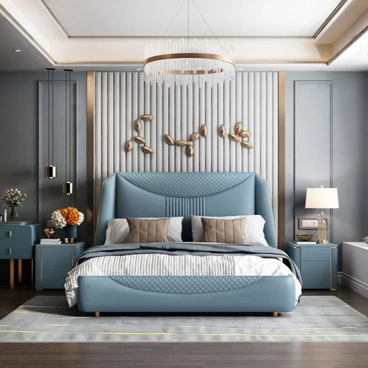 Modern bedroom with a blue bed and decorative wall art.