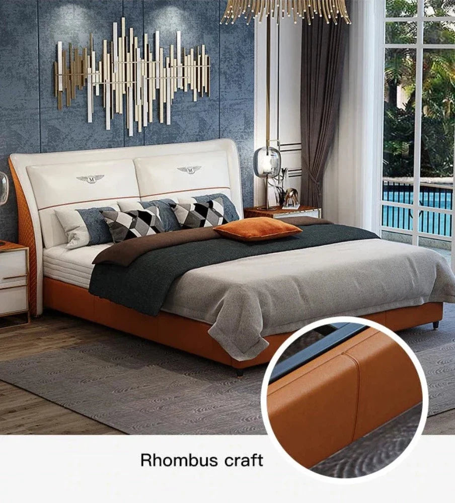 Grand Luxury King Size Upholstered Bed with Winged Padded Headboard, Metallic Crest Emblems, and Tan Accents – Available in Standard or Hydraulic Storage