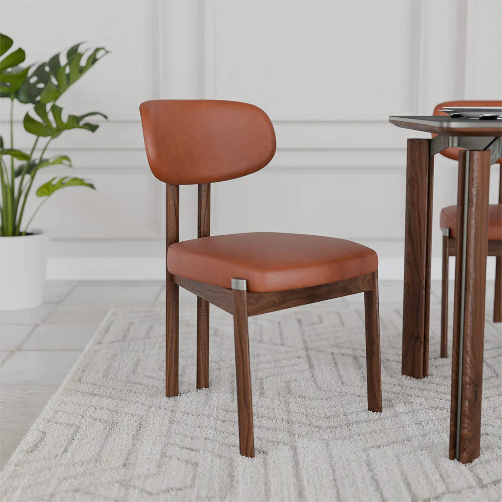 Dining Chair with Sleek Silhouette and Cushioned Seat for Refined Interior Styling