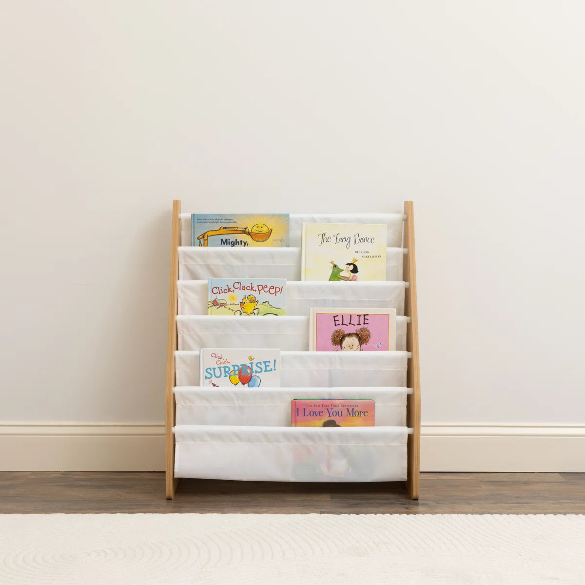 Modern Kids Wooden Sling Bookcase with Front Facing Fabric Shelves – Space Saving Children’s Book Display Rack for Nursery, Bedroom and Playroom