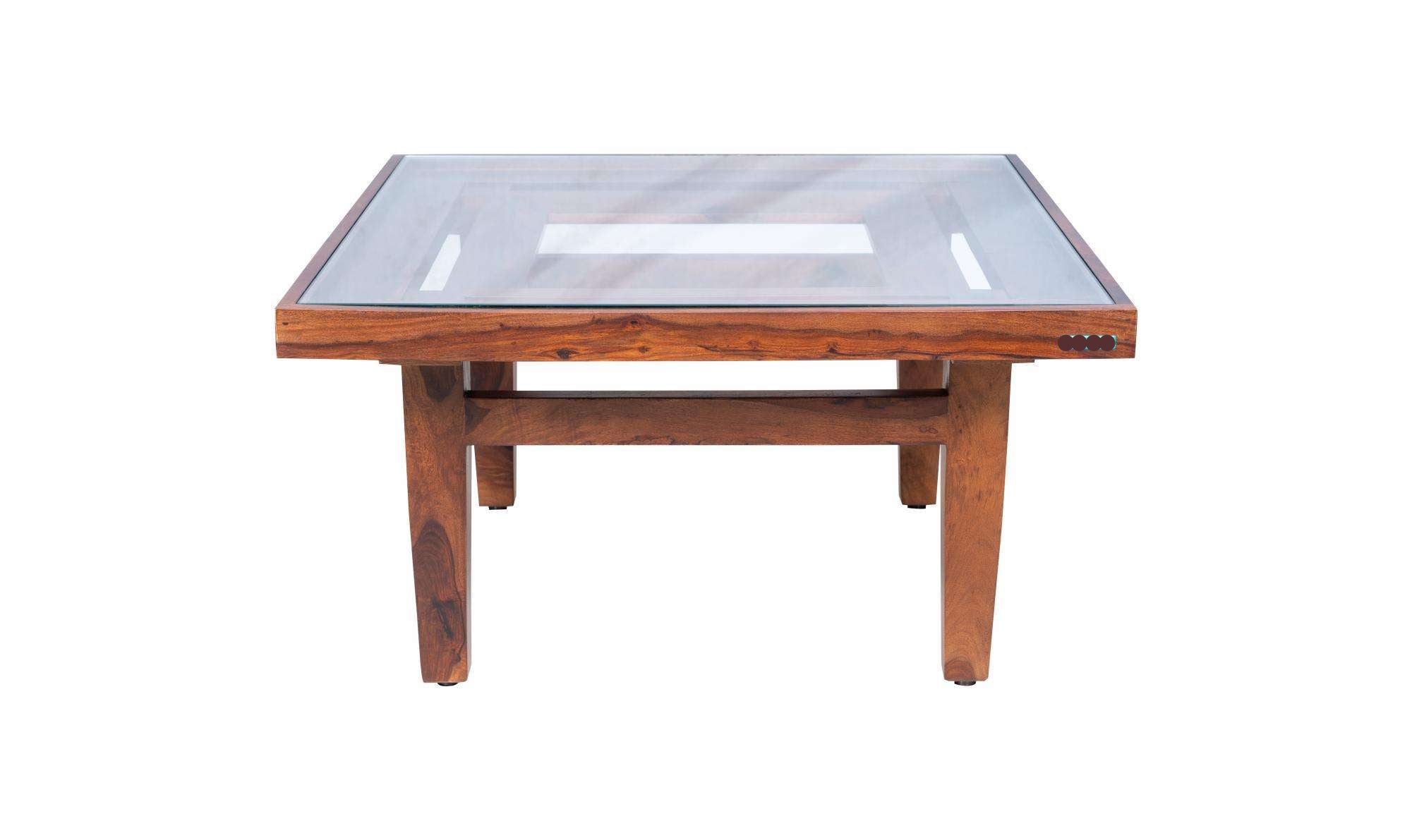 Center Table Featuring Glass Surface and Artistic Legs, Ideal for Sophisticated Living Room Settings