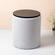 Round side table with woven pattern and wooden top on a plain background