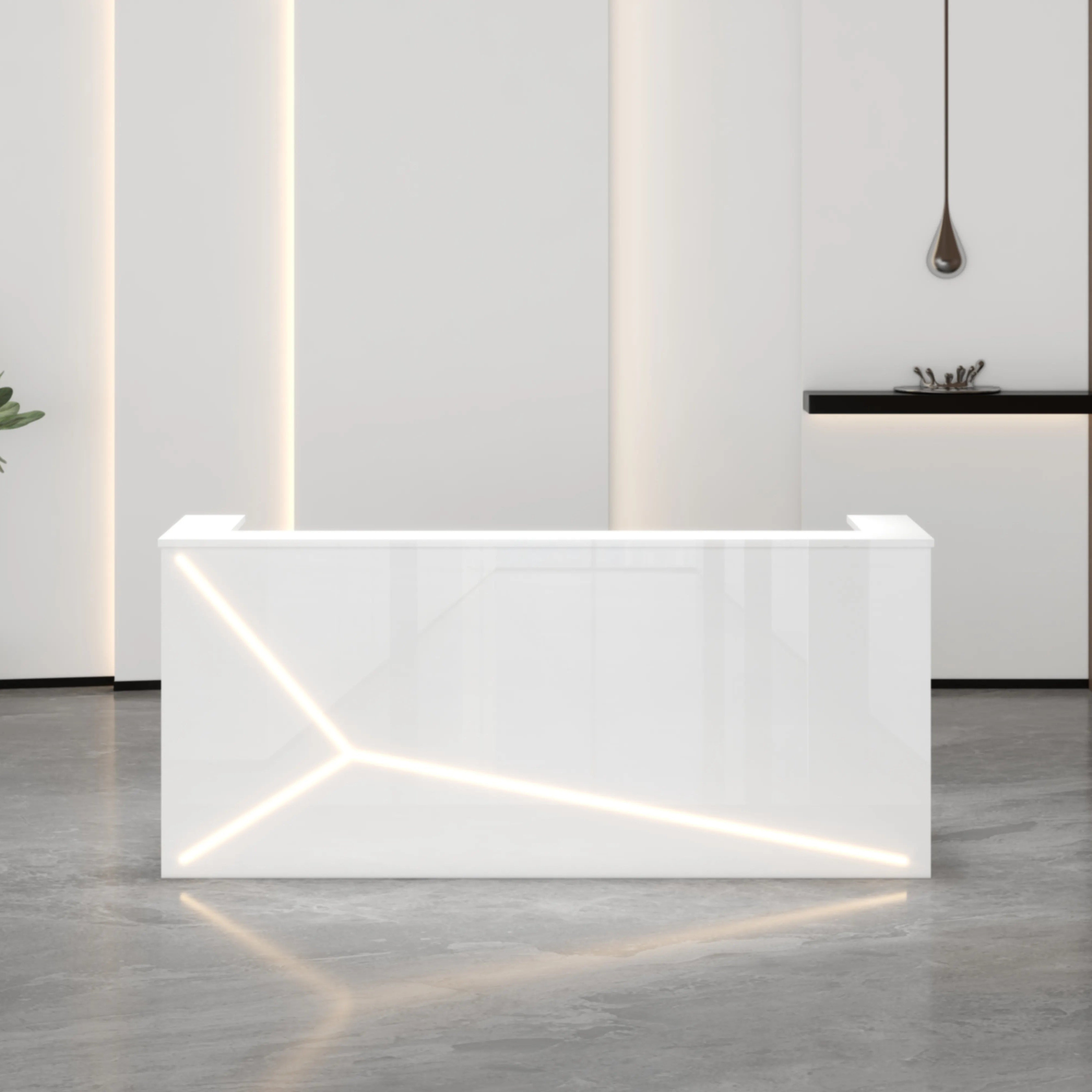 Modern white reception table with wire manager drawers and a simple design, made of MDF, placed in an office setting.