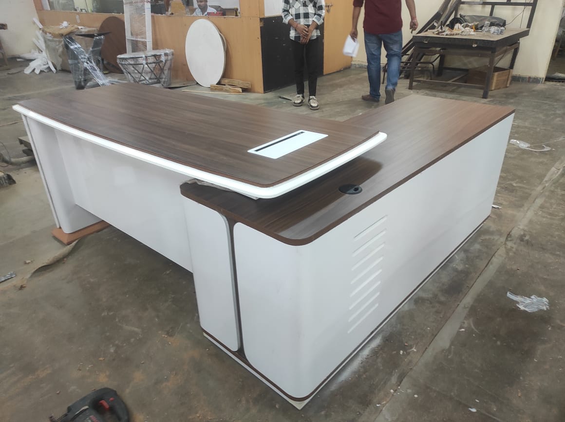 Director and Executive L shape Table Made in Plyboard with Veneer and high glossy finish.