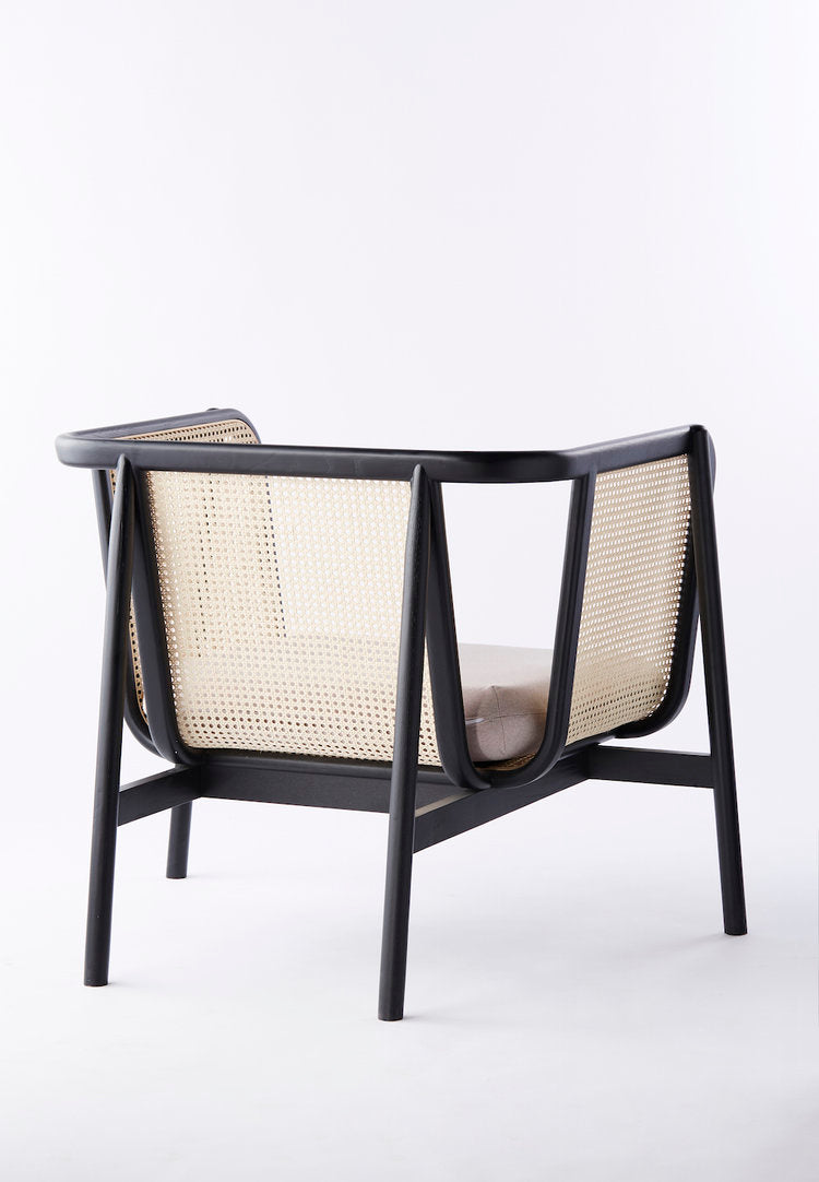 Black Wooden Armchair with Handwoven Cane Back & Sides – Contemporary Lounge Chair with Cushioned Seat