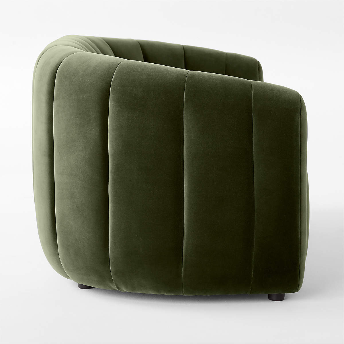 2 Seater sofa  in rich green velvet, deco-inspired loveseat looks good from every angle -