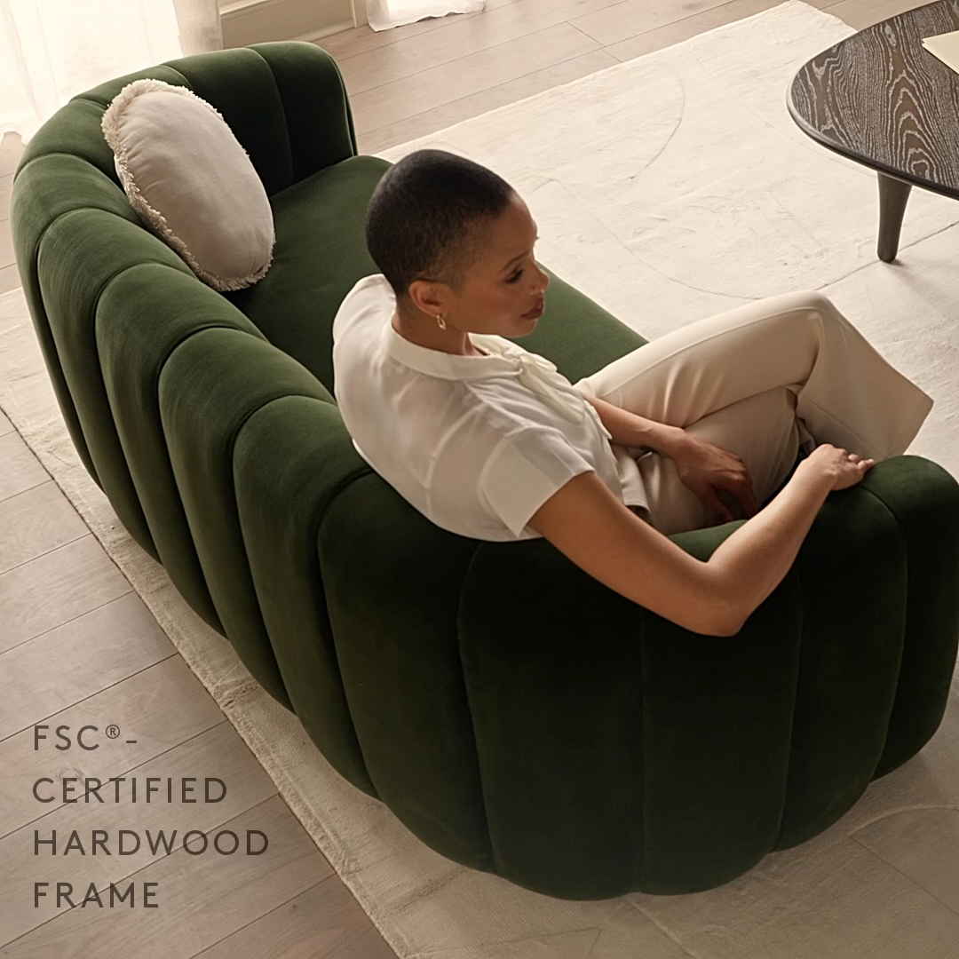 2 Seater sofa  in rich green velvet, deco-inspired loveseat looks good from every angle -