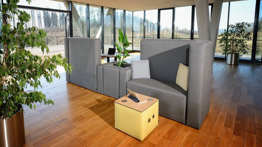 2-Seater Office Focus Sofa with Enclosed Seating Space with Workspace Divider Sofa with enclosed meeting areas in modern workplace environments.