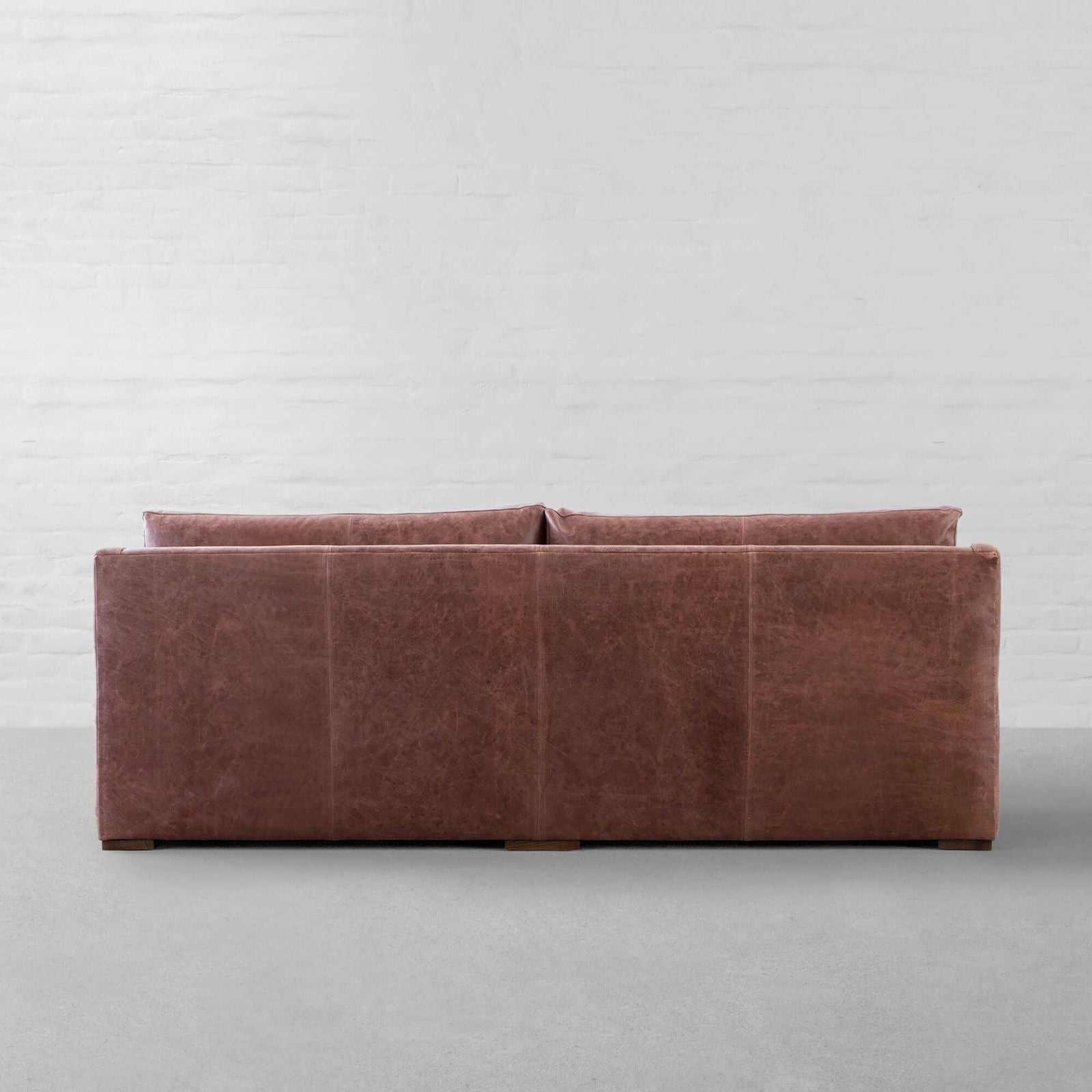 4 Seater Brown Sofa in Leatherette Upholstery Soft curved corners & slim armrest with Handcrafted Kiln-dried hardwood frame -