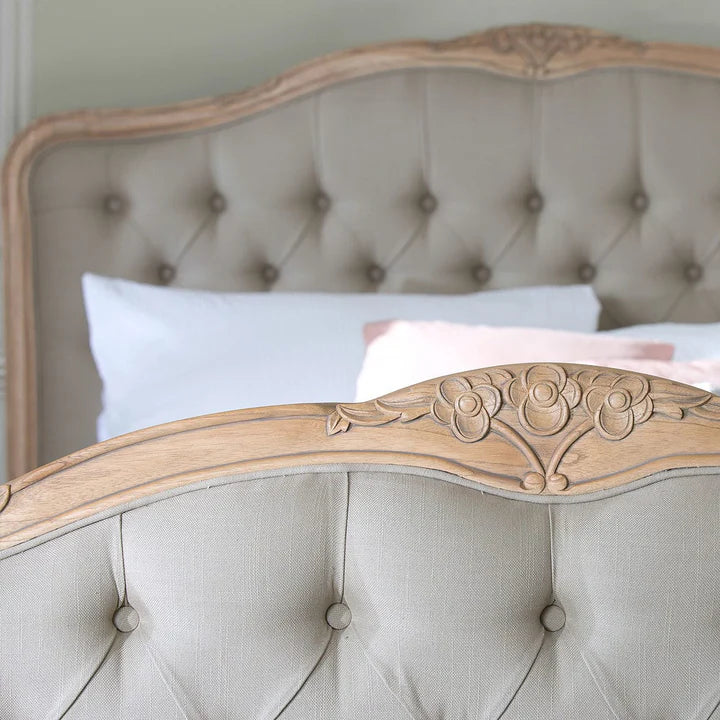 king-size bed with hand-carved Sheesham frame, premium upholstered headboard & footboard.