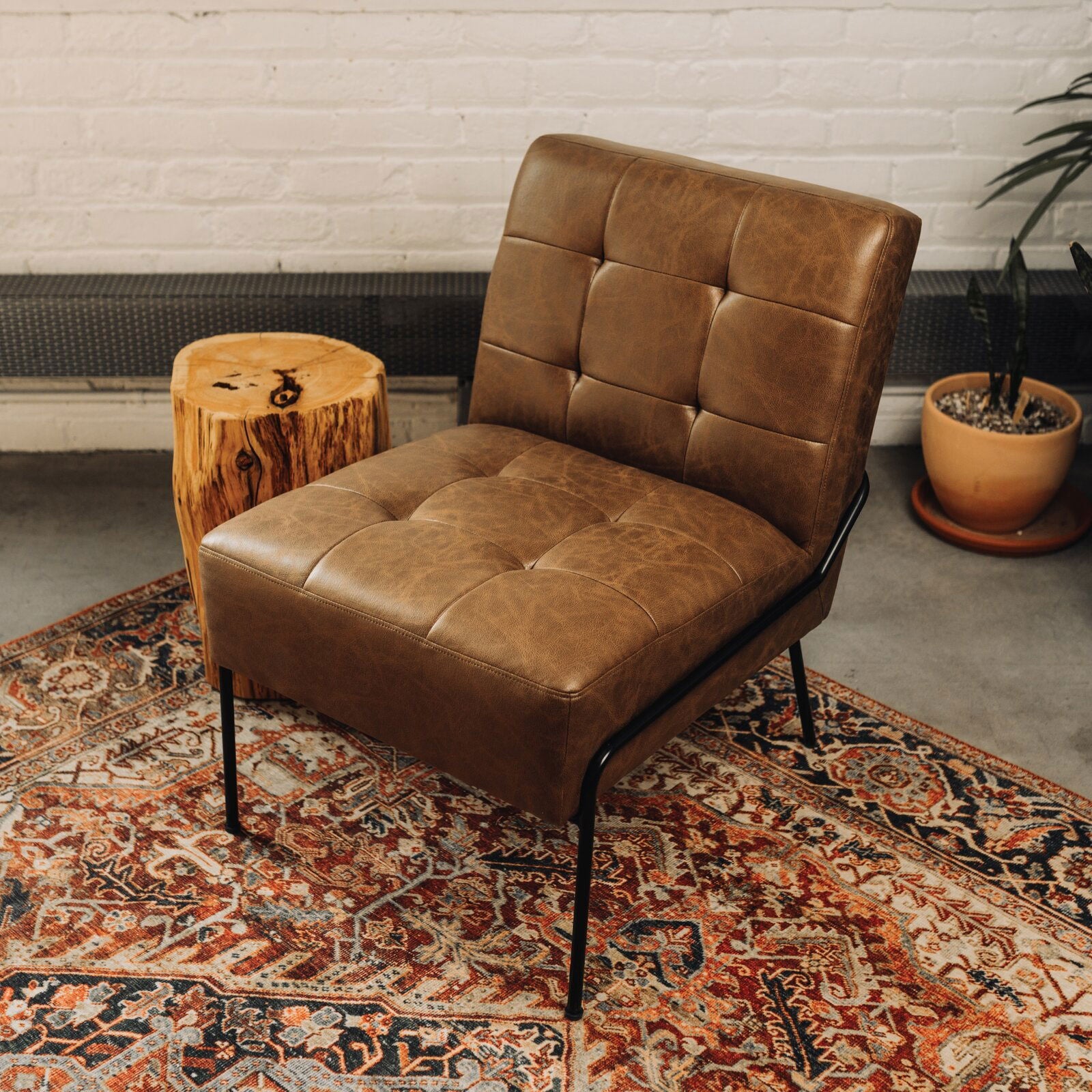 Armless Tufted Brown Chair With Metal Legs -