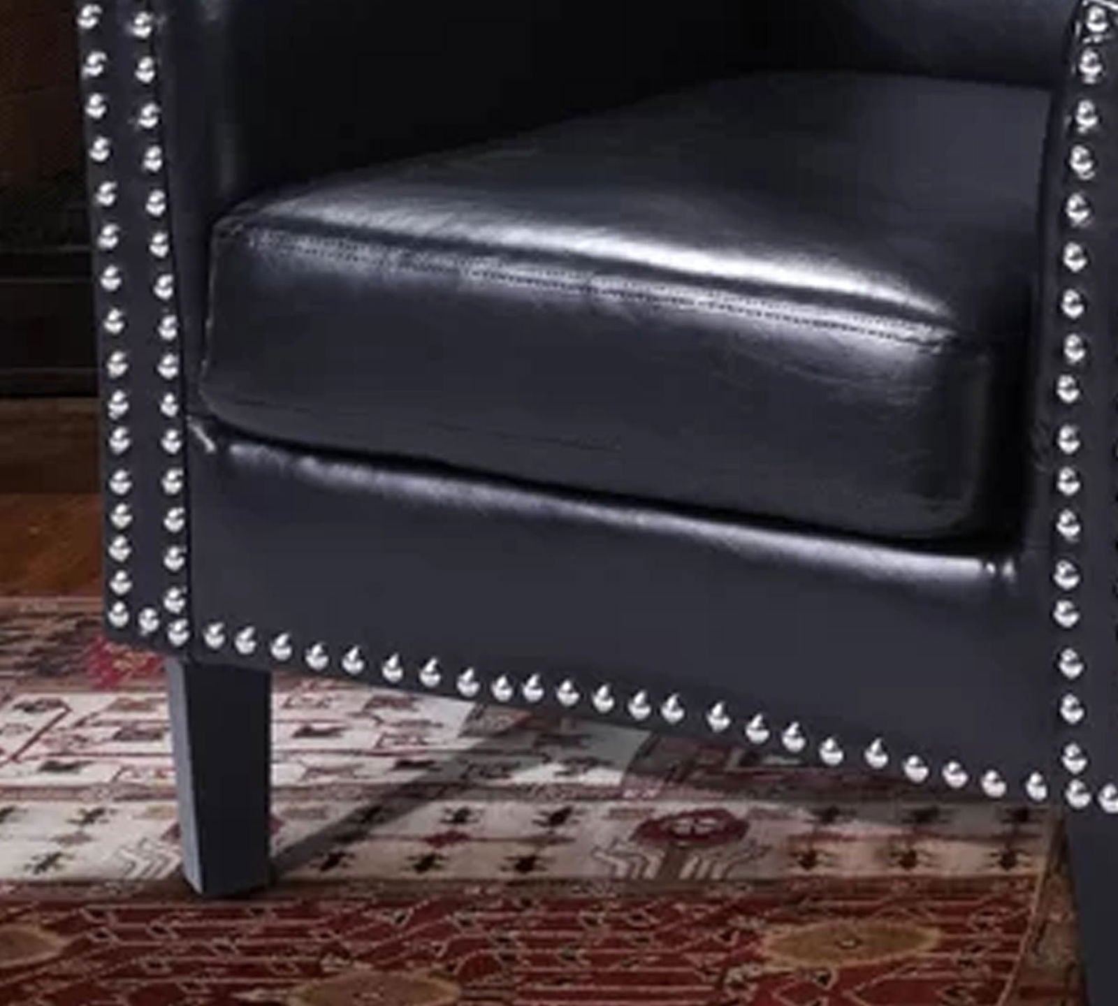 Lounge Chair Upholstered in Leatherette with Trackarms -