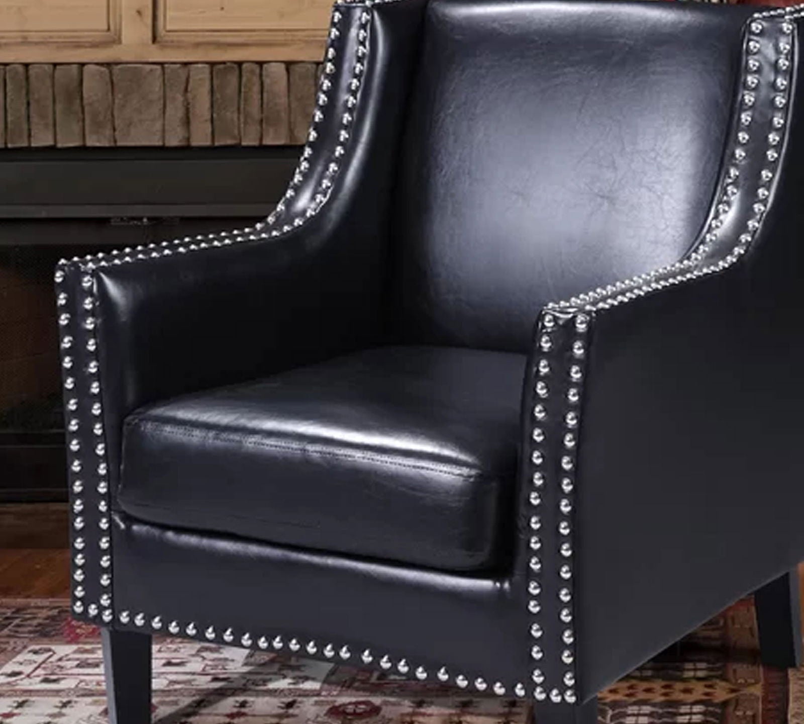 Lounge Chair Upholstered in Leatherette with Trackarms -