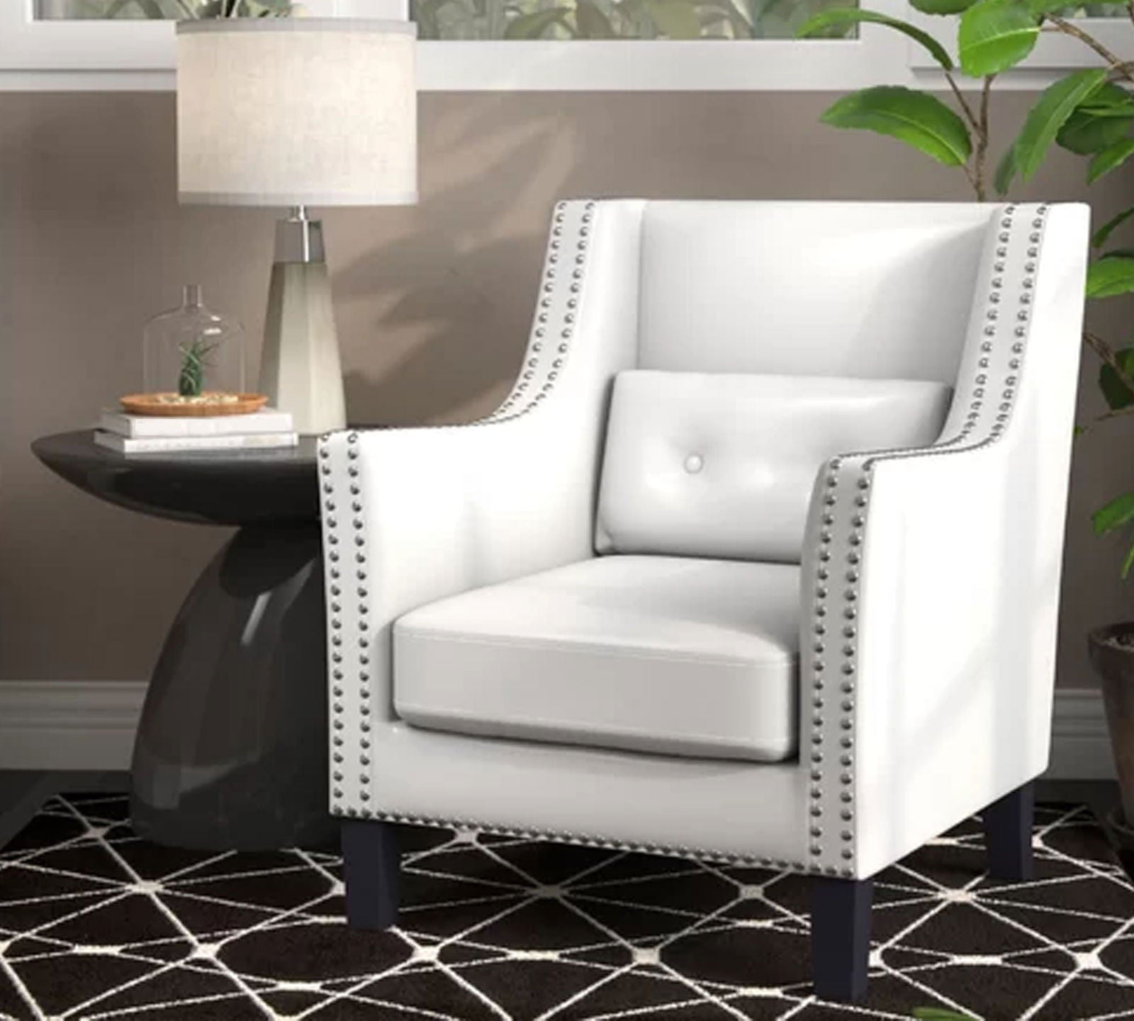 Lounge Chair Upholstered in Leatherette with Trackarms -