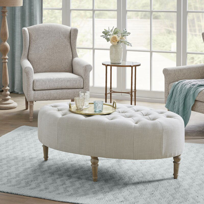 Ottoman in Fabric Upholstery & Wooden Base -