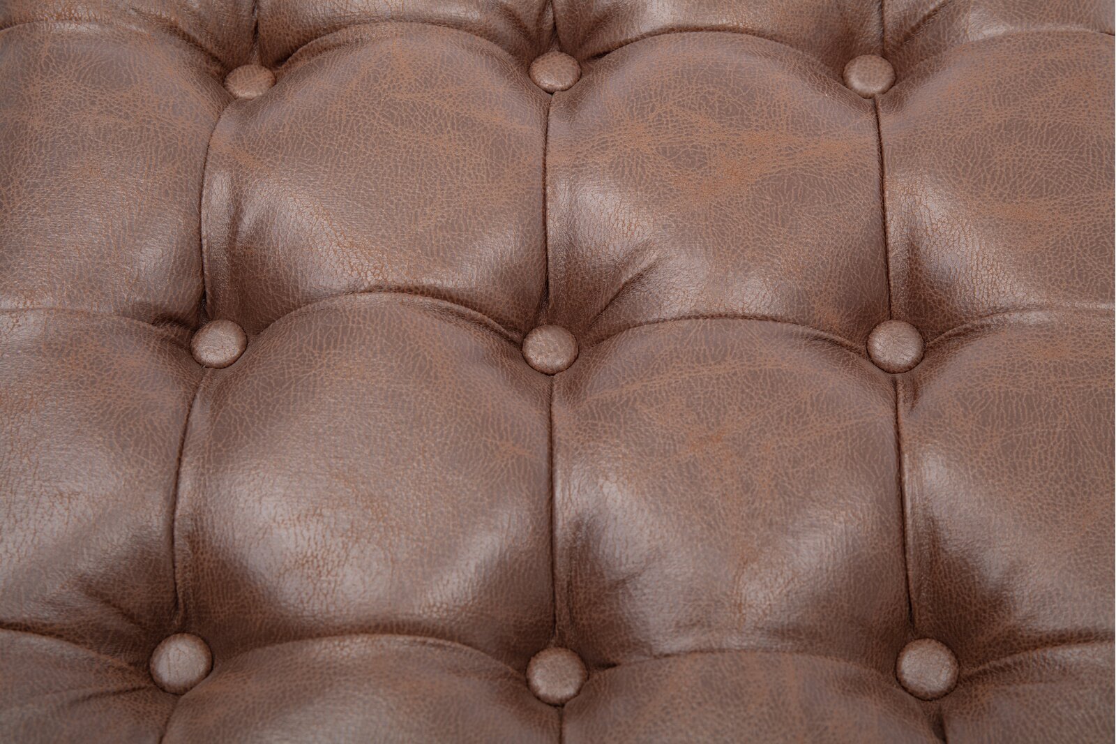 लेदरेट अपहोल्स्ट्री और मेटल बेस ओटोमन