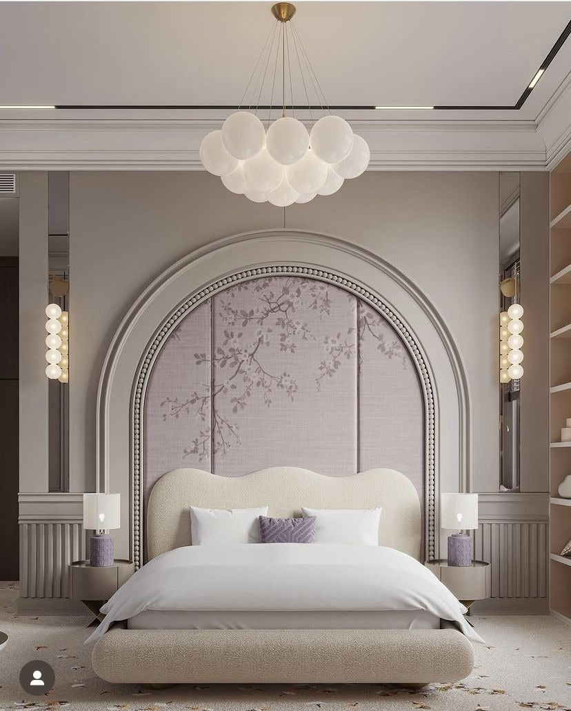 Sophisticated Bedroom with Arched Headboard & Pendant Lighting