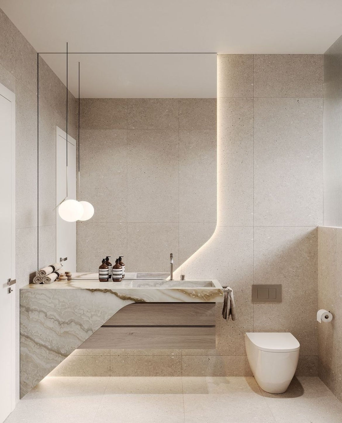 Elegant Minimalist Washroom with Warm Lighting & Marble Vanity