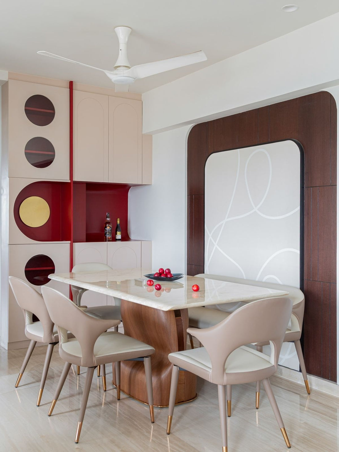 Contemporary Dining Room – 10ftx 12ft Space with Sculpted Furniture and Luxe Red Accents