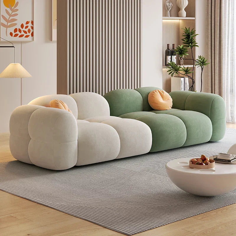 Luxurious 4 -seater sofa crafted with premium velvet fabric and a solid wood frame designed to elevate modern living rooms with comfort and timeless elegance