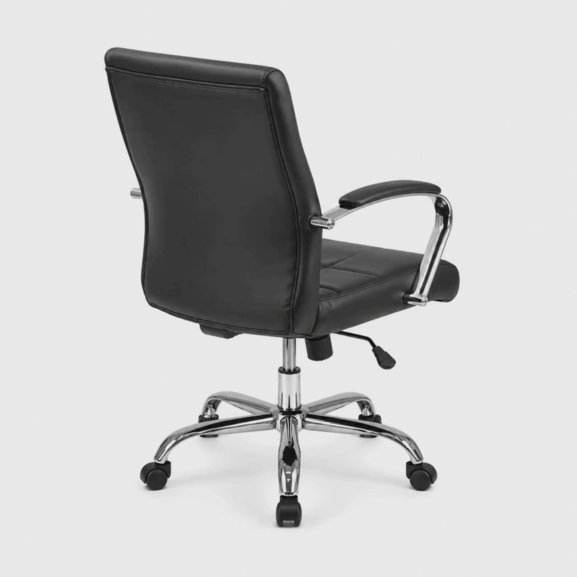 Load video: Executive Mid Back Office Chair with Leatherette Upholstery, Chrome Armrests, Height Adjustable Swivel for Office, Conference Room and Home Workspace