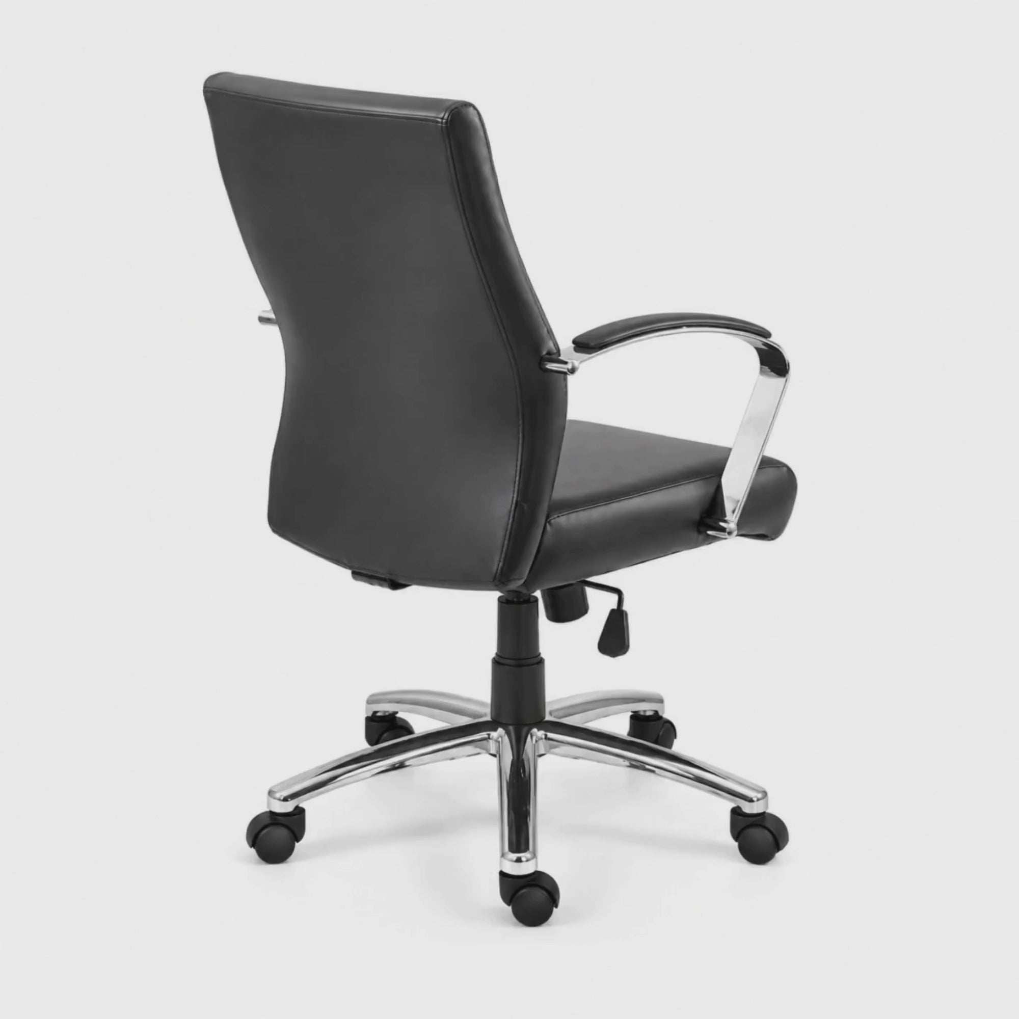 Load video: Executive Mid Back Office Chair with Leatherette Upholstery, Chrome Armrests, Height Adjustable Swivel Chair for Office, Conference Room &amp; Home Workspace