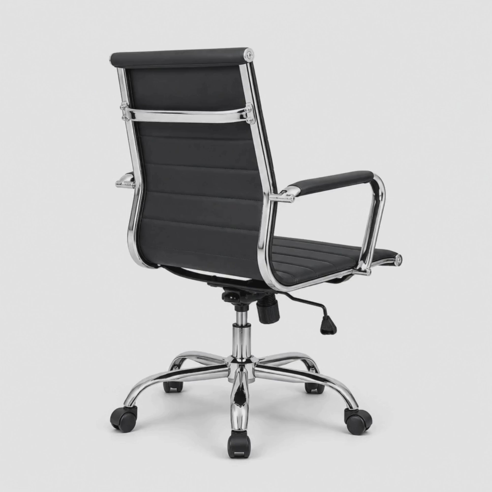 Load video: Executive Mid Back Ergonomic Office Chair with PU Upholstery, Chrome Armrests &amp; Base, Height Adjustable Swivel Mechanism for Office &amp; Home Use