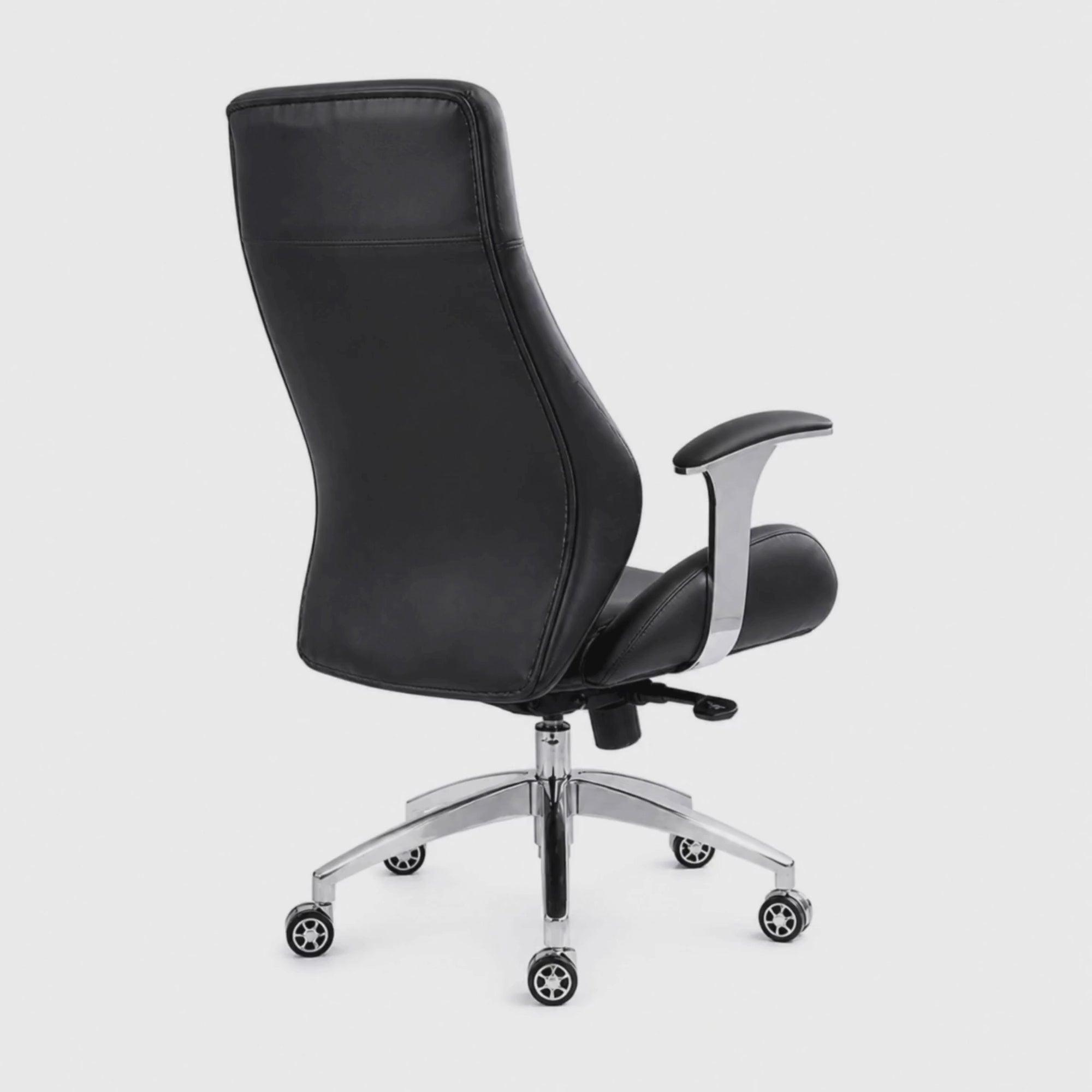 Load video: High Back Office Chair with Leatherette Upholstery, Chrome Base, and Powder Coating for Enhanced Durability
